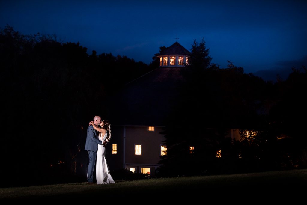 A couple on their wedding day in a beautiful night photo by Vermont wedding photographer
