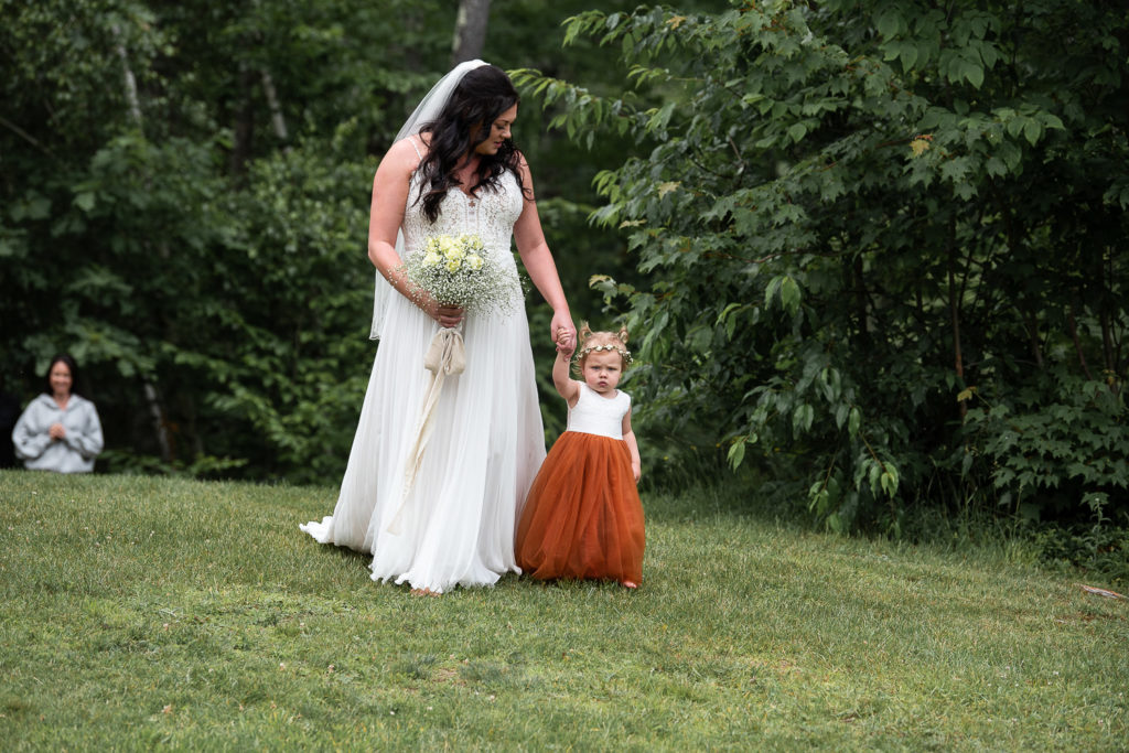 bride with flower girl