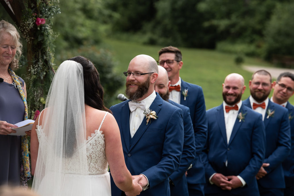 wedding ceremony groom smiling